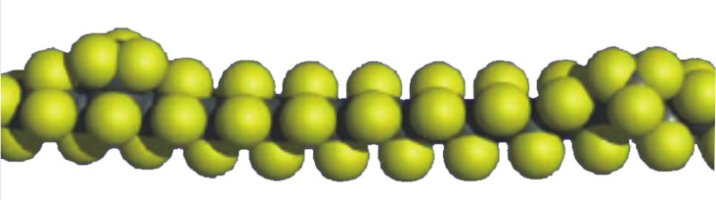 A close-up view of green, spherical objects arranged in a spiral pattern around a central axis on a white background.